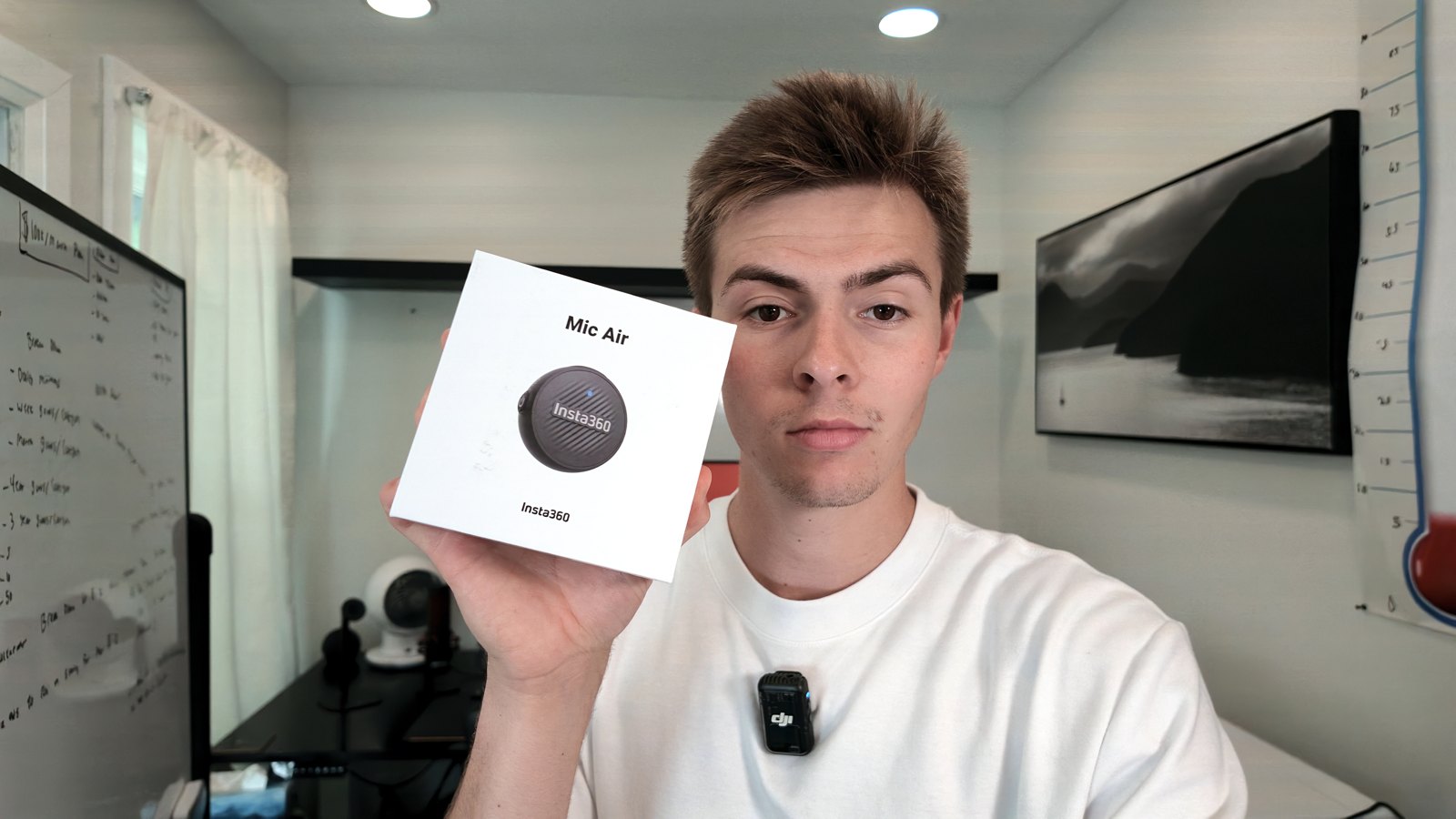 Aidan holding the Insta360 Mic Air box